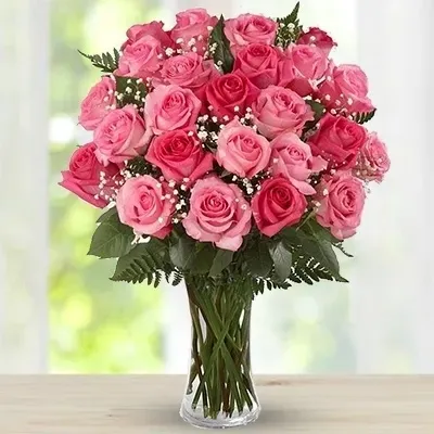 24 Pink Rose in a glass vase. (One side round arrangement)