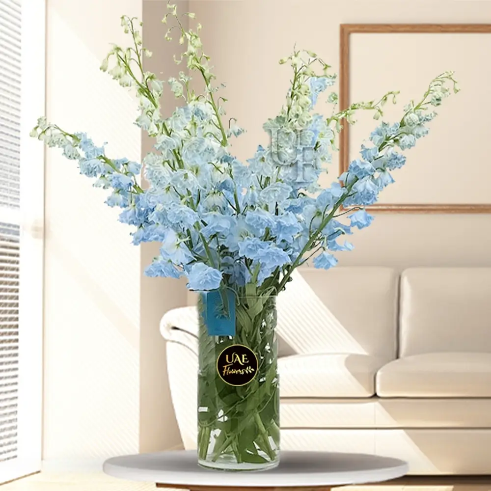 10 blue delphinium & fillers in a Vase