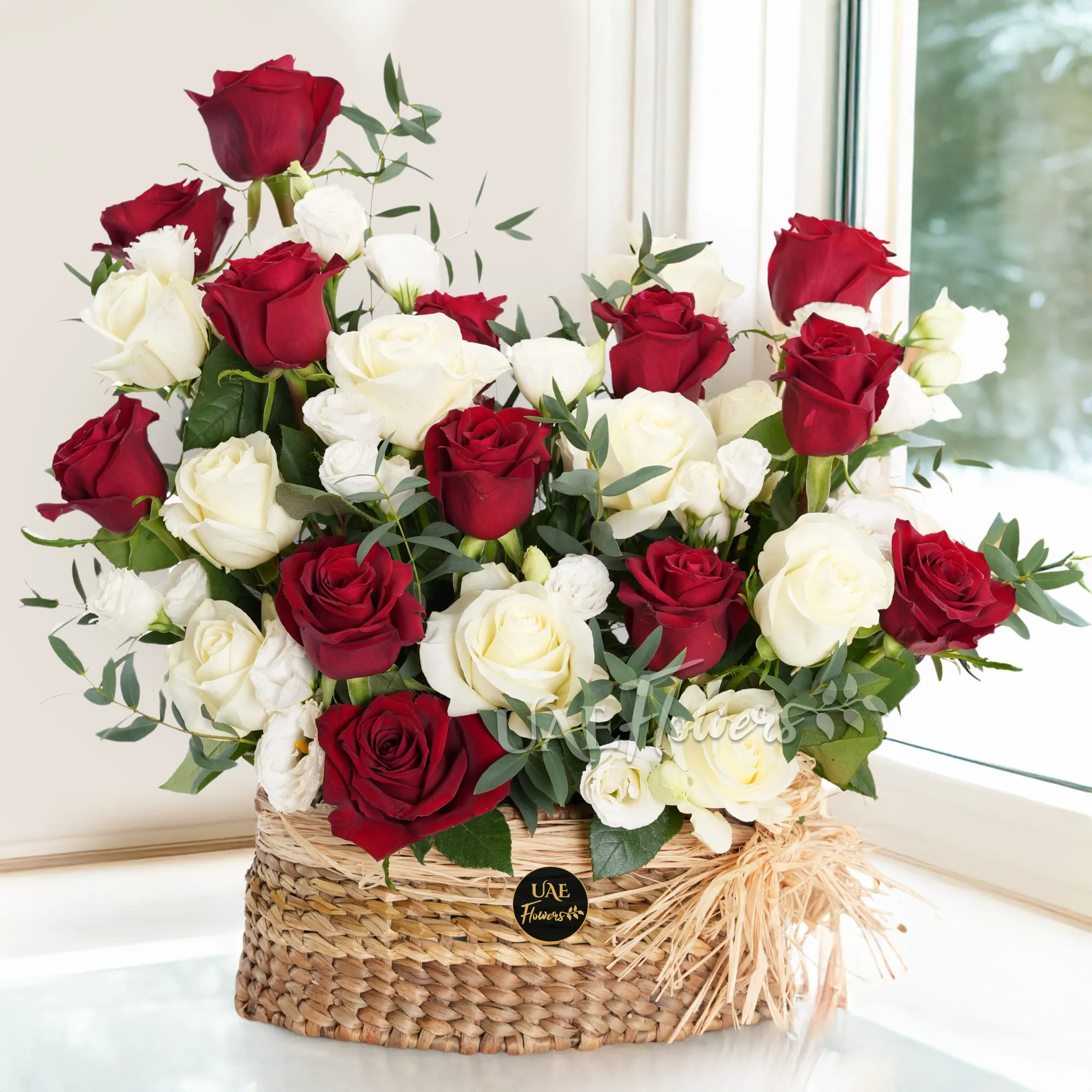 basket of 20 red and white roses with 5 white spray roses and green fillers