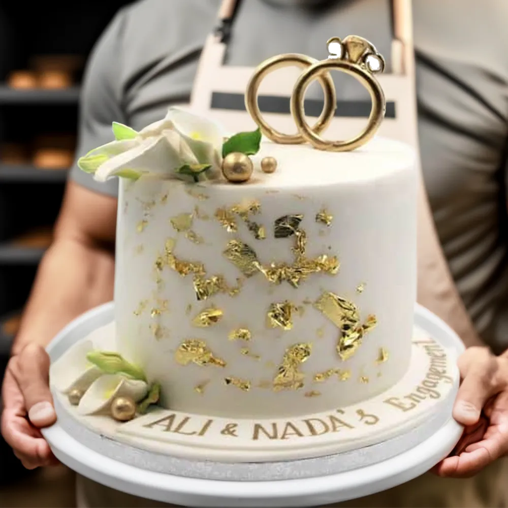 Elegant Golden Rings Cake designed for weddings, engagements, or anniversaries, serving 18–20 people