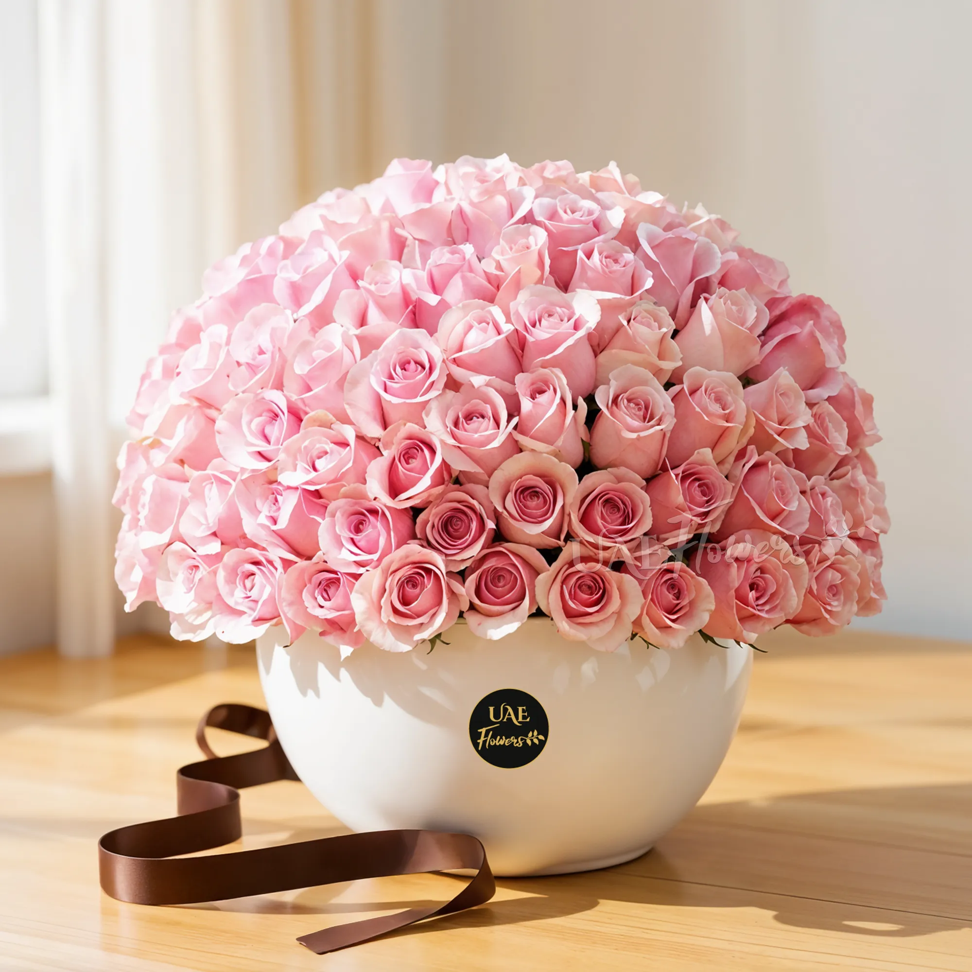 100 pink roses in a ceramic vase