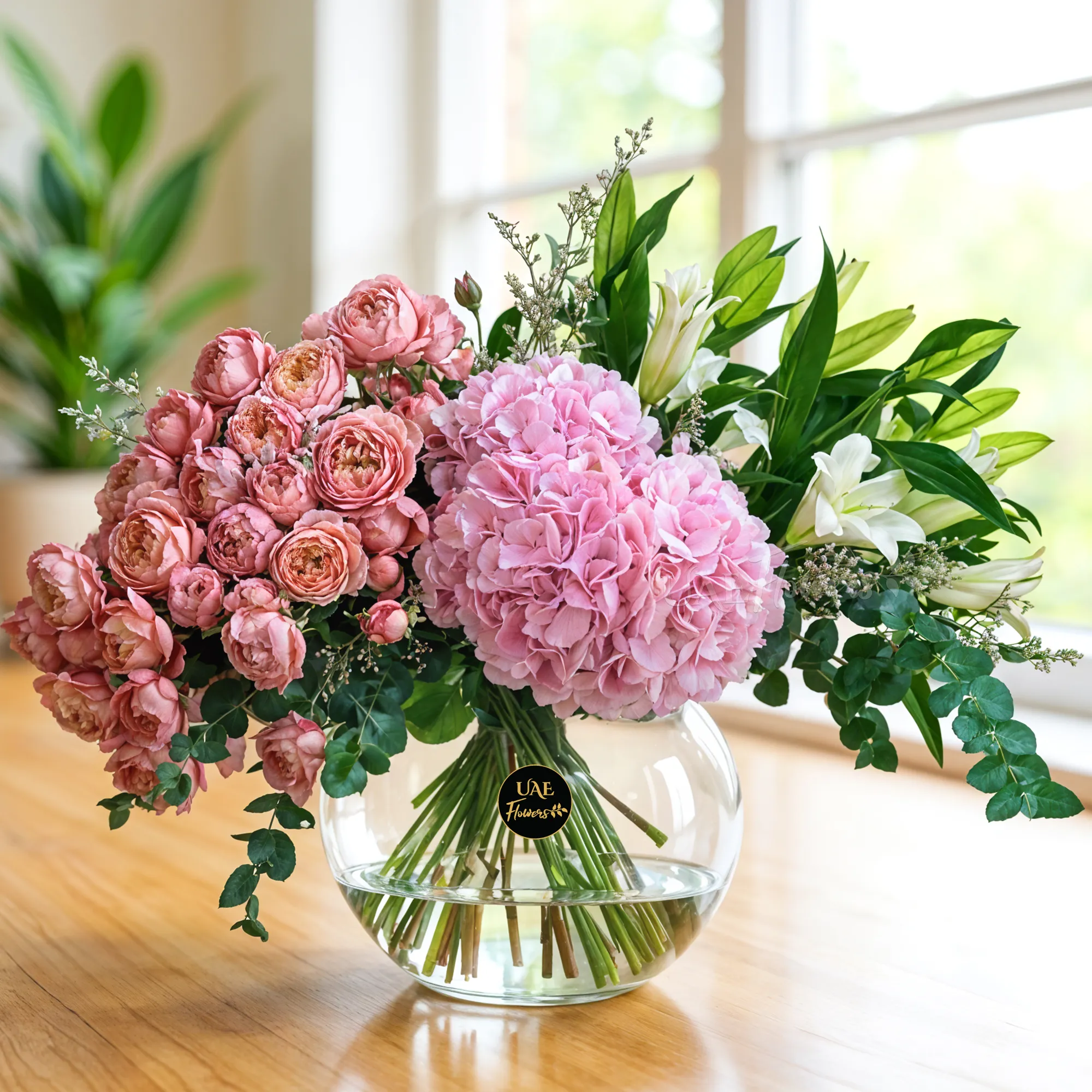 10 Juliette spray roses, 3 pink hydrangeas, 4 white lilies,