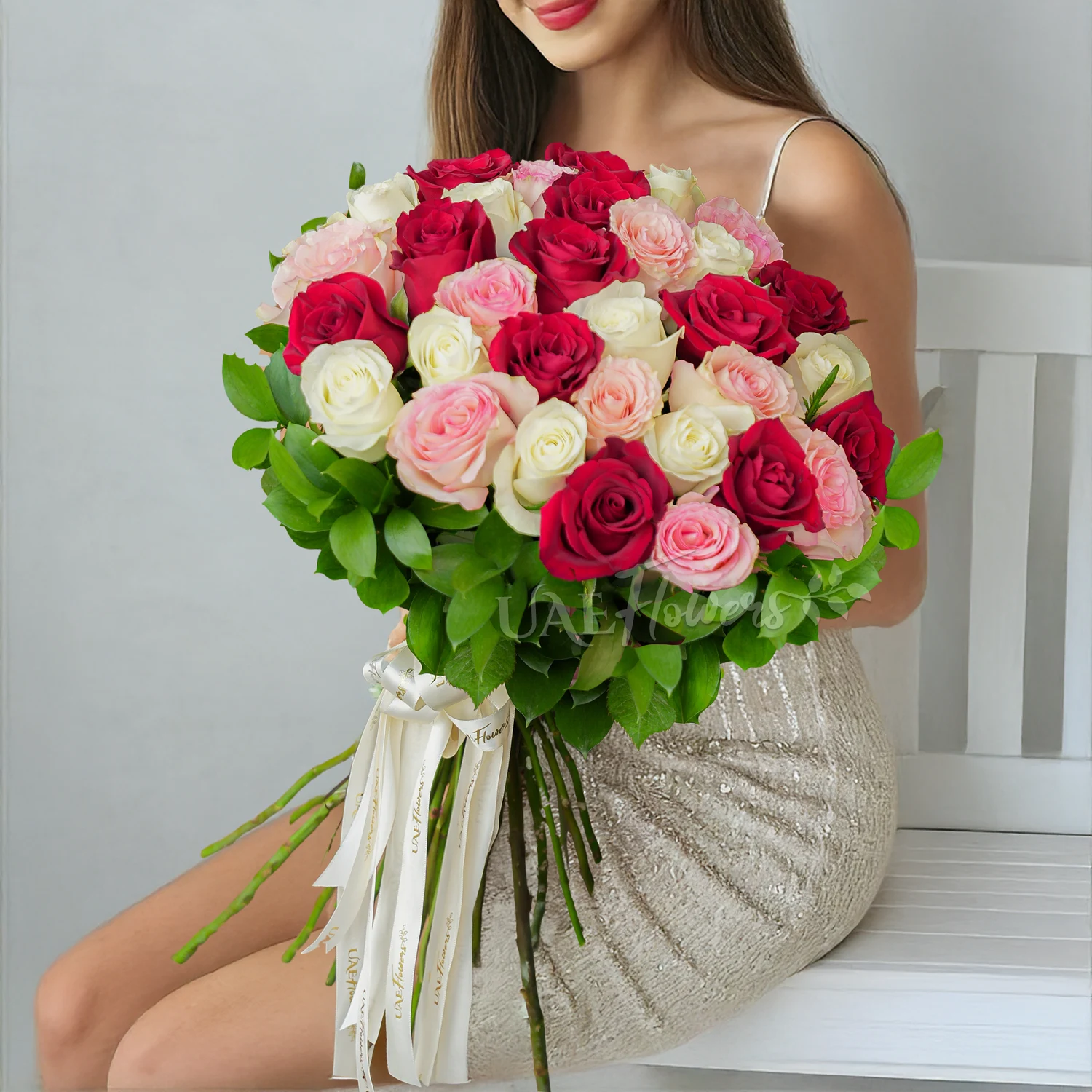 31 red, white, and pink roses