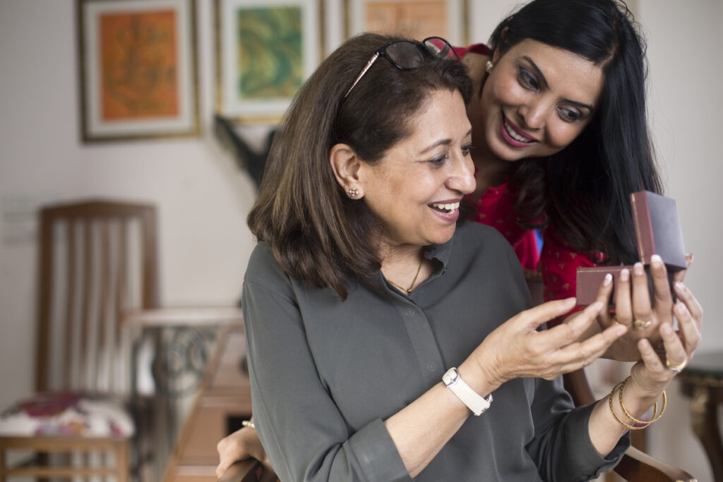 A Women Gifting a Ring to her Mother on Mother's Day Traditions